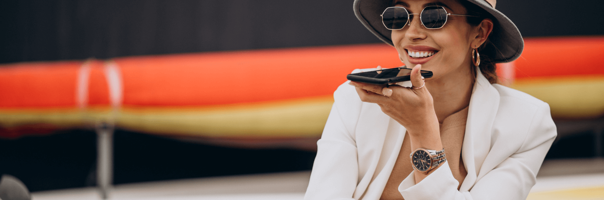 young-woman-wearing-hat-using-phone