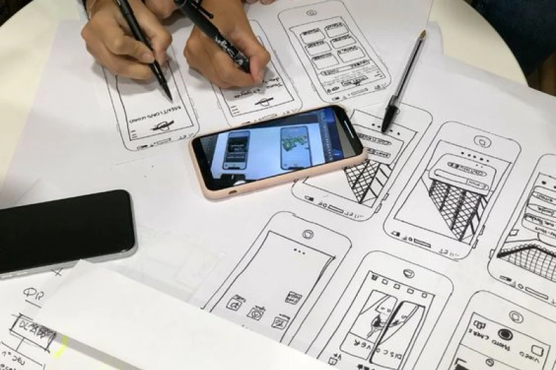 User interface and experience design process for a Flutter mobile app, focusing on smooth navigation, visual appeal, and consistent performance across Android and iOS platforms.