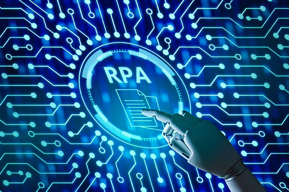 Robotic hand activating RPA interface on digital circuit board, symbolizing integration of AI and robotic process automation by a top agentic AI development company.