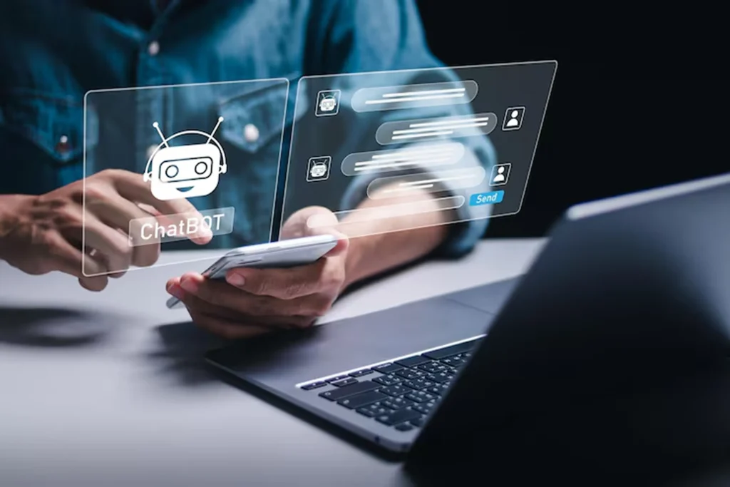 Person using smartphone and laptop with chatbot interface, symbolizing how ChatGPT’s AI Agent Mode performs backend research tasks like planning, web browsing, data extraction, and content synthesis for automated, goal-driven workflows.