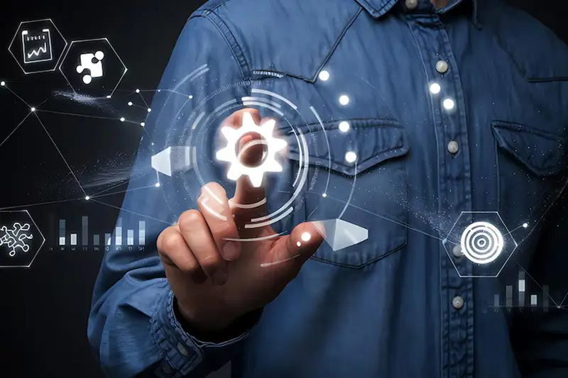 Person activating a digital gear icon, surrounded by futuristic data and analytics visuals—representing MLOps development services used to modernize an e-commerce recommendation engine with automated pipelines and real-time monitoring.