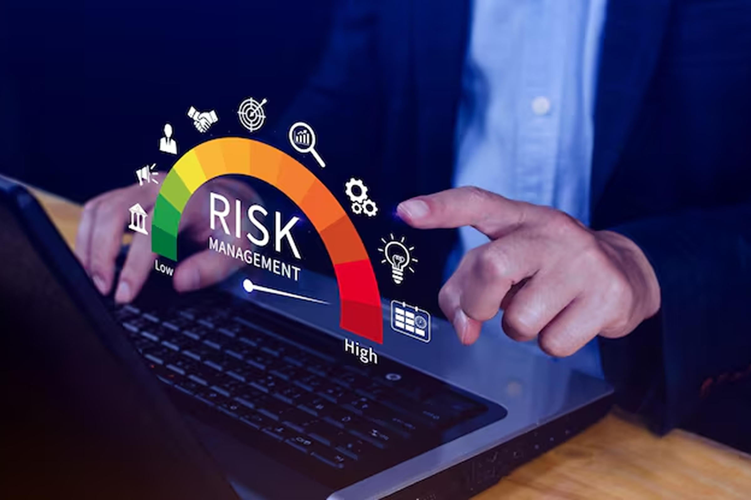 Business professional using a laptop with a digital risk management gauge, representing how AI outsourcing services reduce operational and technical risks through structured and proven methodologies.