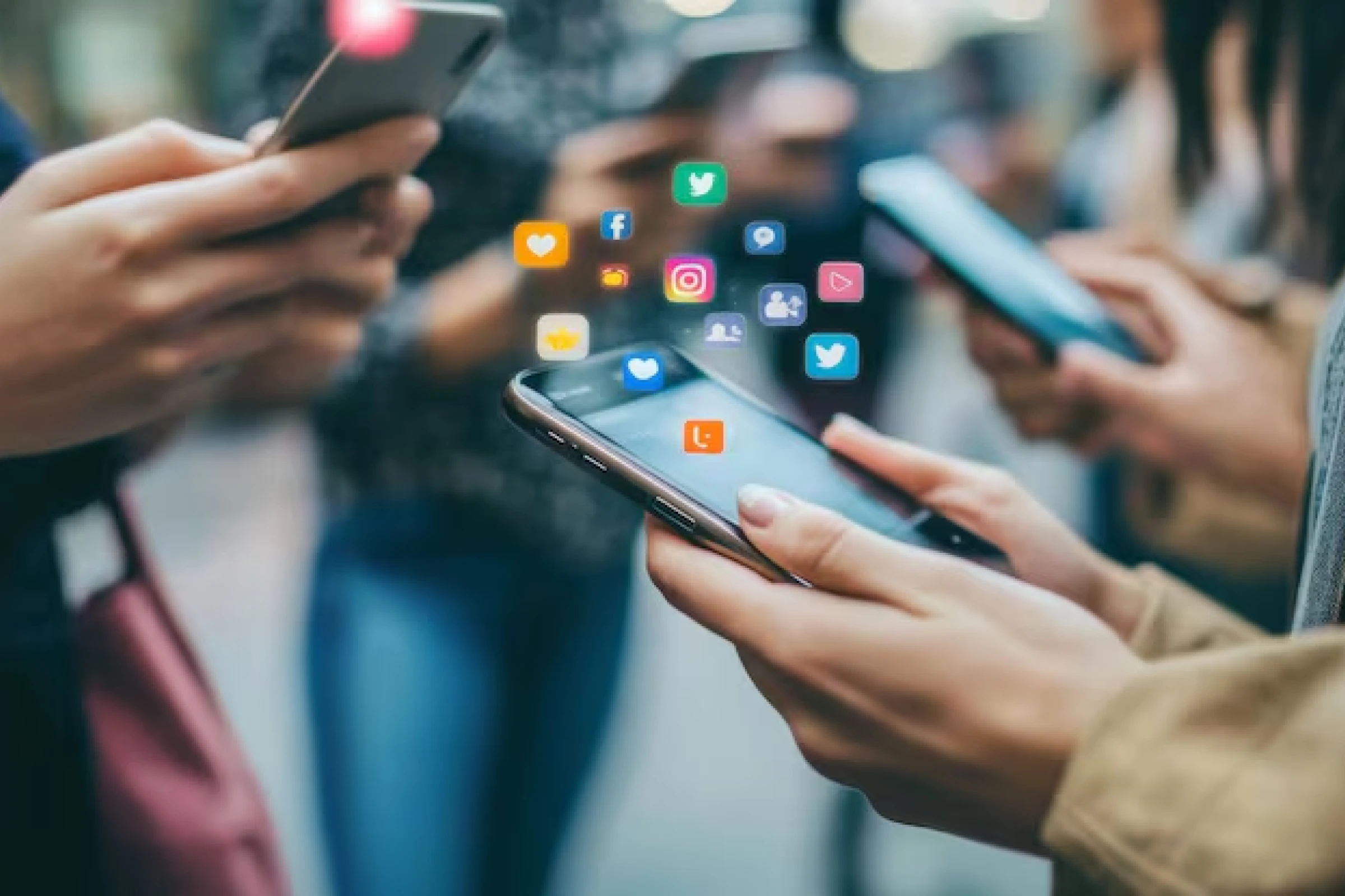 Custom mobile app development for social networking apps showing users engaging with messaging, activity feeds, notifications, and community features on smartphones