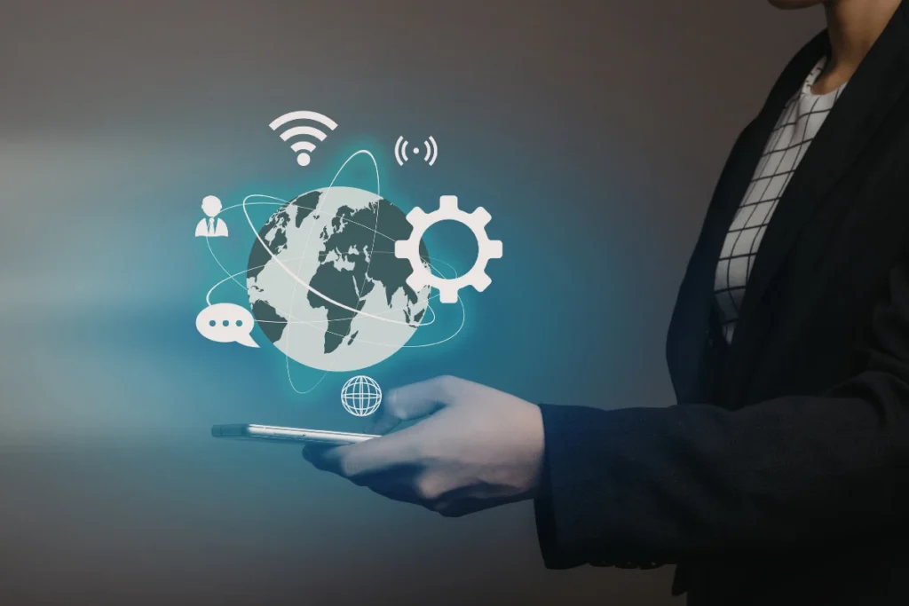 A person holding a smartphone with digital icons representing global connectivity, communication, and tools, symbolizing the integration of third-party libraries and plugins to enhance app functionality.